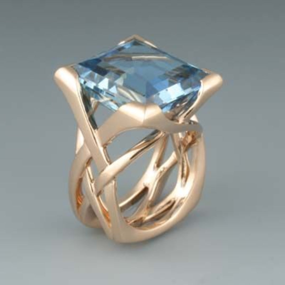 Rose Gold Blue Zirconia Ring β Timeless Elegance
